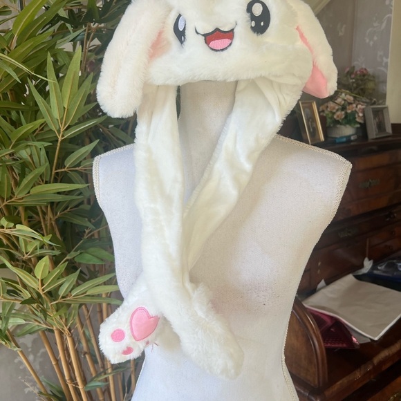 Bunny hat, new with tags super cute when you press the pause the ears go up - Picture 9 of 13